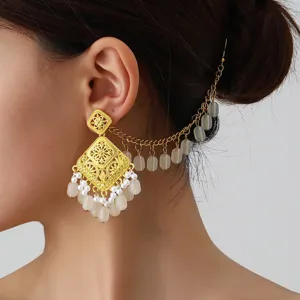 Ethnic gold filigree geometric earrings detail with pearl tassel and hair chain accessory
