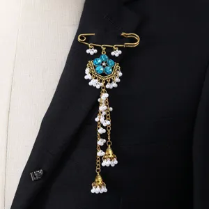 Exquisite vintage rhinestone tassel safety pin brooch for women, elegant ethnic style jewelry.