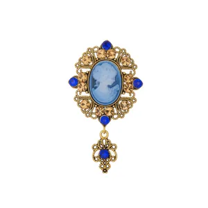 Vintage cameo brooch ornate filigree rhinestones blue portrait pendant detail jewelry close up