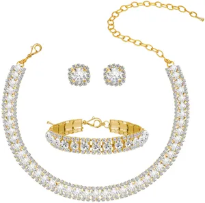 Detailed view of the sparkling rhinestone gold necklace, bracelet and earrings jewelry set.