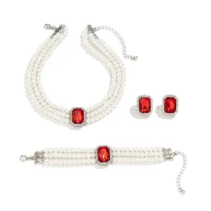 Elegant French vintage multi-layer pearl necklace, bracelet and earrings jewelry set.