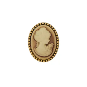 Detailed view of the vintage cameo brooch, featuring an elegant lady relief with gold beaded bezel.
