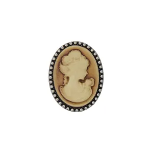 Close-up detail view of a vintage cameo brooch featuring an elegant carved woman profile in silver frame.