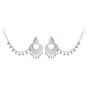 Indian vintage silver ethnic carved tassel ear chain detail closeup fashion jewelry accessory