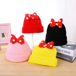 Kids winter knit beanie hat with cute big red polka dot bow, warm and stylish for toddler boys and girls.