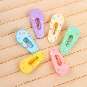 Detailed view of colorful polka dot hair clips, cute candy color acrylic side pins set.