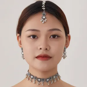 Ethnic bohemian silver choker necklace earrings head chain detail shot for women stylish jewelry.
