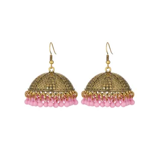 Gold-tone carved jhumka drop earrings with delicate pink beaded fringe for ethnic styles.