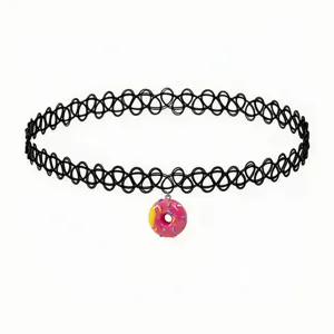 Close-up of black elastic tattoo choker necklace with cute pink donut pendant and sprinkles.