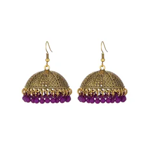 Vintage ethnic jhumka earrings with gold-tone filigree and purple bead tassels for women.