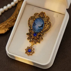 Exquisite vintage blue cameo rhinestone brooch, elegant retro court style jewelry detail shot.