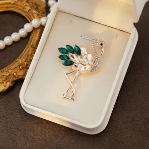 Elegant rhinestone flamingo brooch for women, stunning crystal pin for apparel and hat decor.