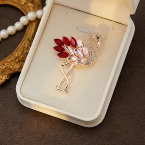 Elegant crystal flamingo brooch pin for women, fashion alloy rhinestone dress lapel accessory.