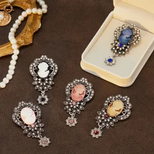 Vintage cameo rhinestone brooch pin set, elegant Victorian style fashion jewelry accessory.