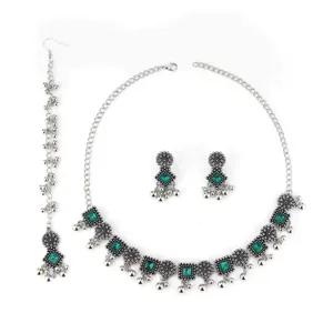 Detailed view of bohemian ethnic green rhinestone choker necklace earrings and set