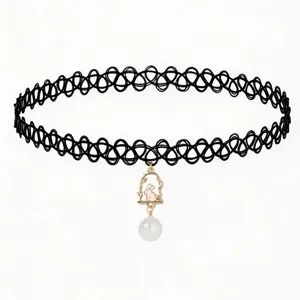 Close-up detail of the black tattoo choker necklace with cute pendant and pearl drop.
