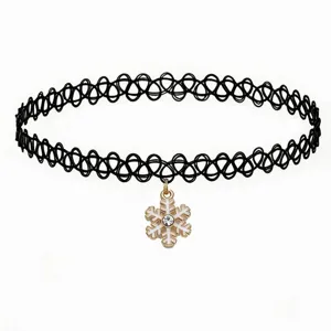 Black tattoo choker necklace with a sparkling rhinestone snowflake pendant for women.