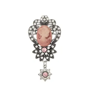 Vintage silver tone cameo brooch detail, pink portrait pendant with rhinestone crystals.