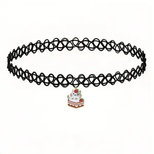 Detailed view of the black tattoo choker featuring a cute cat and strawberry cake pendant.