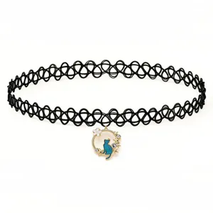 Close-up detail of a black stretchy choker necklace featuring a cute blue cat and rhinestone pendant.