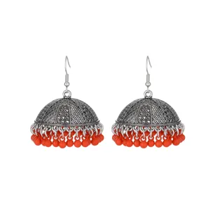 Traditional silver jhumka earrings with red bead tassels, ethnic vintage drop earrings.