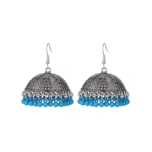 Ethnic silver-toned bell-shaped Jhumka earrings with vibrant blue beaded dangles for women.