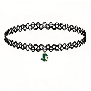 Black tattoo choker necklace featuring cute green dinosaur pendant, trendy aesthetic fashion jewelry.