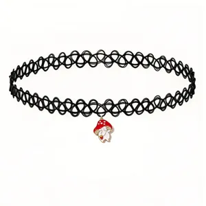 Close-up detail of a black tattoo stretch choker necklace with a cute mushroom pendant.