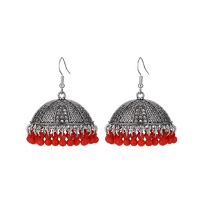 Vintage silver-toned jhumka earrings with red bead fringe, ethnic lantern drop ear hooks.