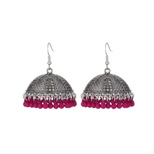 Vintage silver-tone Jhumka drop earrings with pink beaded tassels for women fashion detail.
