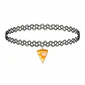 Detailed shot of a black tattoo choker necklace featuring a cute citrus pie slice pendant.