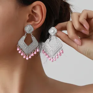 Vintage silver tone carved geometric drop earrings with lovely pink beaded fringe detail.