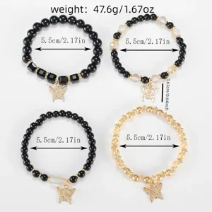 Detail view of crystal beaded bracelets with butterfly pendants, showing size specs.