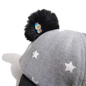 Grey children winter baseball cap featuring white stars and a cute black pom-pom detail
