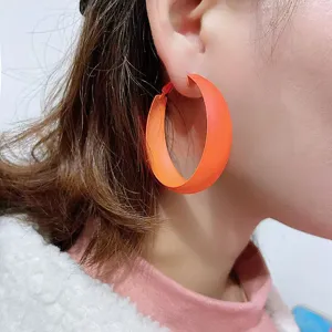 Stylish orange hoop earrings for women, minimalist geometric metal circle earrings for daily wear