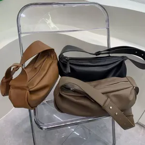 Soft faux leather shoulder bag set, casual pleated crescent crossbody design for women.