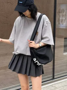 Casual canvas crossbody dumpling bag for daily travel and outdoor streetwear fashion use.