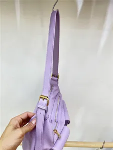 Purple motorcycle style shoulder bag for women, trendy crossbody tote with multi-pockets.