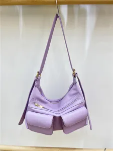Purple leather motorcycle shoulder bag with multi pockets and zippers for women daily use.