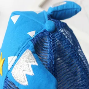 Children blue mesh baseball cap with white spike decorations and cute yellow star embroidery.