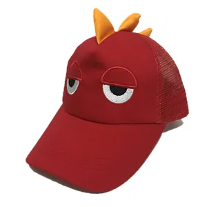 Kids mesh baseball cap detail showing embroidered cartoon sleepy eyes and cute yellow top spikes.