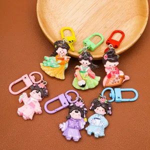 Resin DIY cartoon ancient style girl charms with colorful clasps, detailed close-up shot.