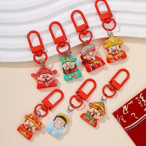 Cute resin God of Wealth keychains, colorful Chinese traditional character bag charms.