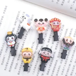 Detailed close-up of cute cartoon resin hair clips featuring various classic characters for kids.