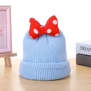 Cute kids winter knitted beanie hat with red polka dot bow, warm baby girl boy cap.
