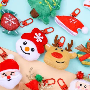 Christmas plush keychain bulk set, cute Santa snowman reindeer tree charms for holiday gifts.