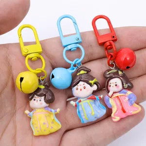 Cute cartoon Tang style princess keychain with colorful bell for lovely bag decoration.
