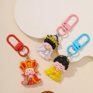 Jolis charms de porte-clés en résine de dessin animé, pendentifs de style national.