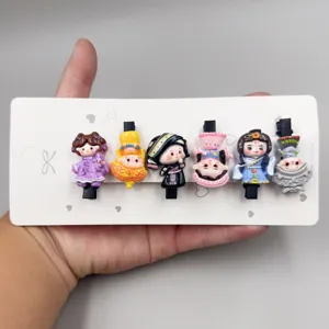 Cute ethnic style cartoon hair clips detail shot, showcasing six unique traditional design figures.