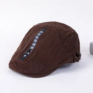 Brown cotton flat cap beret with stylish zipper ribbon detail for casual streetwear and hip hop fashion.
